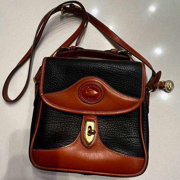 Dooney & Bourke Handbags - Authentic Dooney and Bourke Black and Tan Leather Vintage Square Carrier